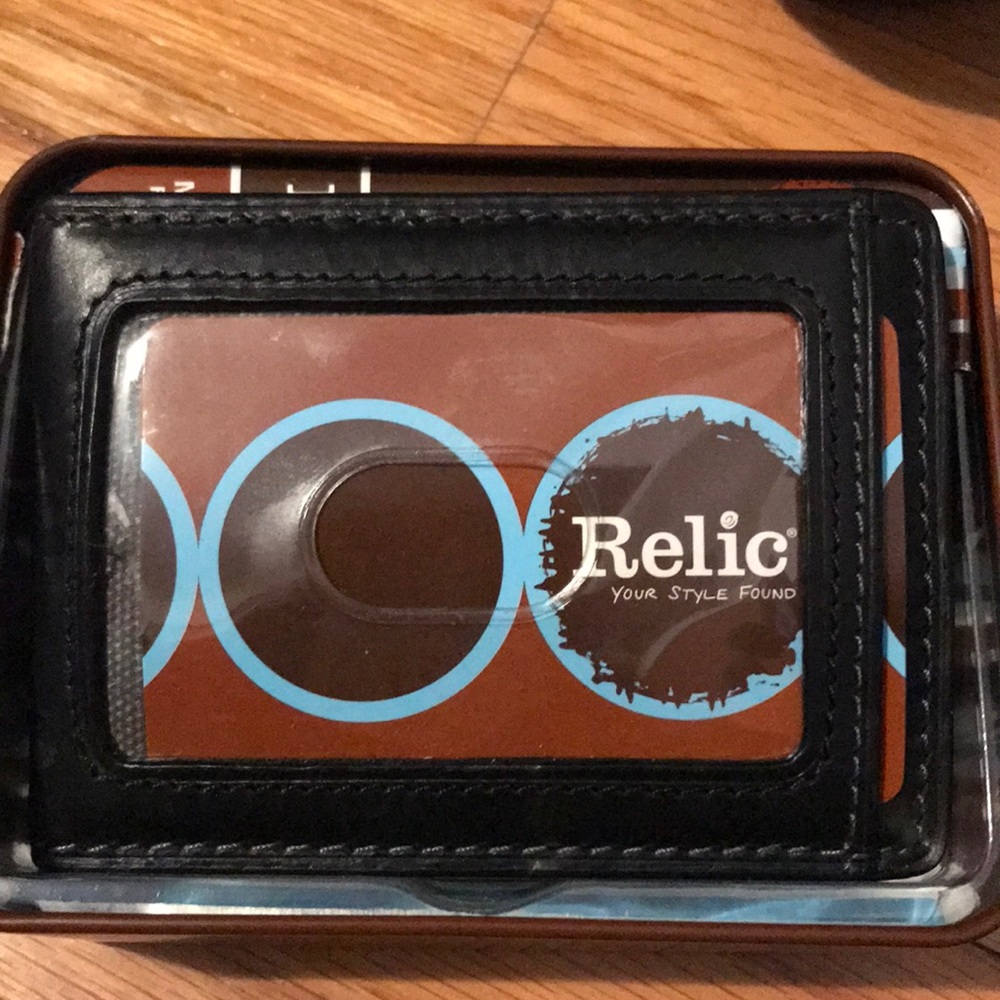 Bi fold wallet w/bottle opener/money clip feature